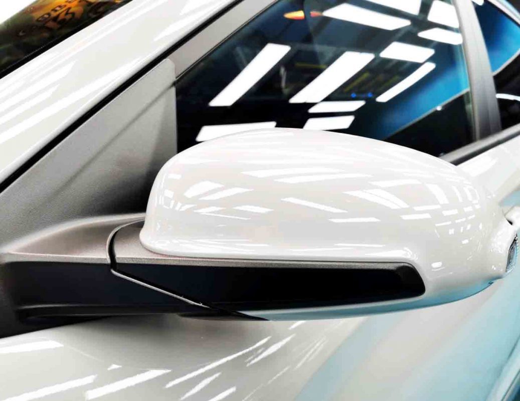 Side panel of the Hyundai OS Kona HEV with the titanium finish locked in.