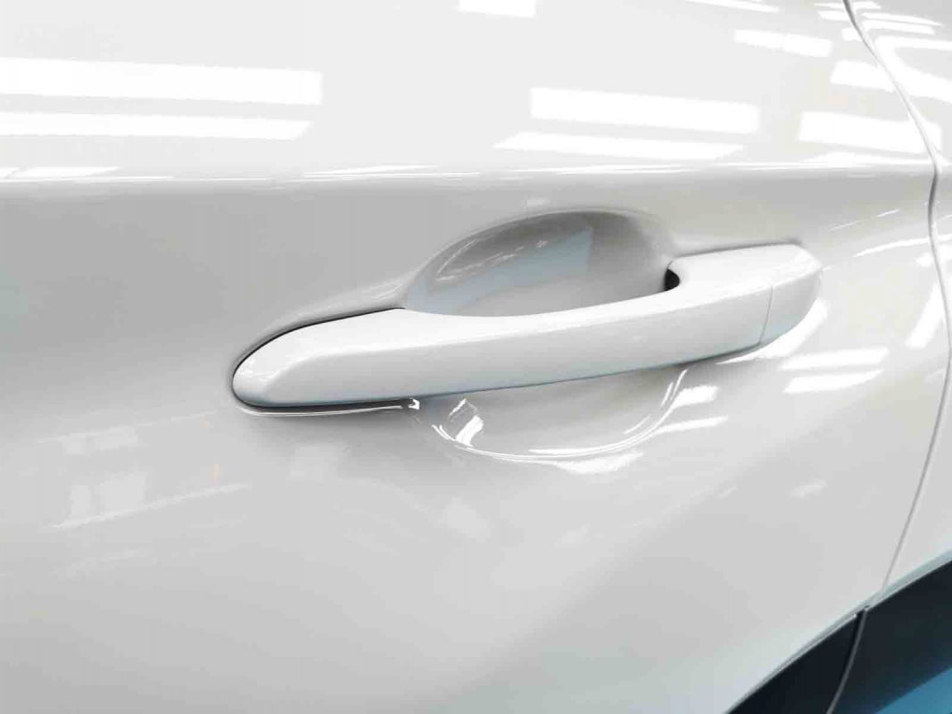 Front three-quarter view of the Hyundai OS Kona HEV after coating.