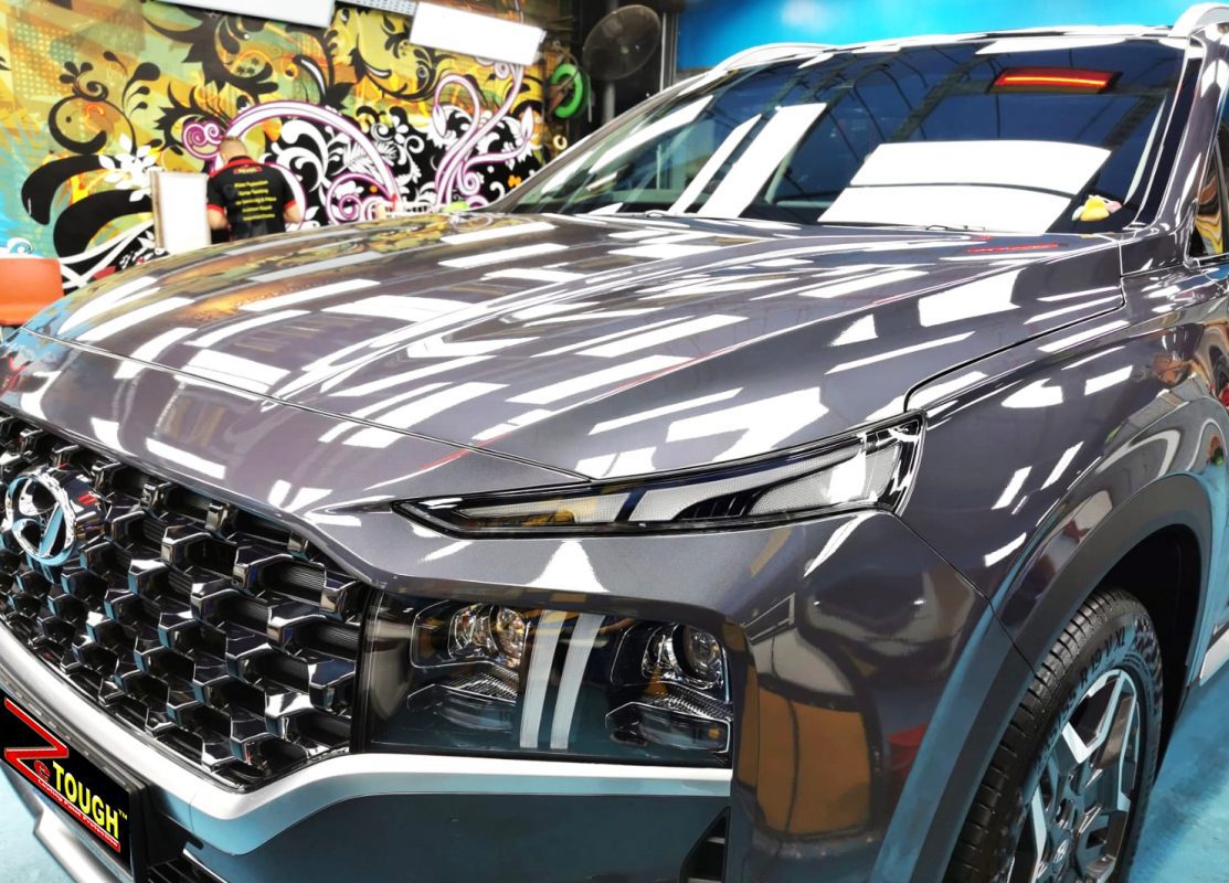 The Hyundai Santa Fe from a side angle after the ceramic coating.