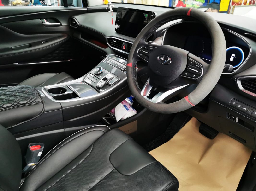 The Hyundai Santa Fe parked in the workshop, freshly coated.