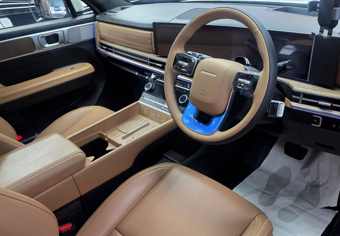 Reflections across the coated panels of the Hyundai Santa Fe.