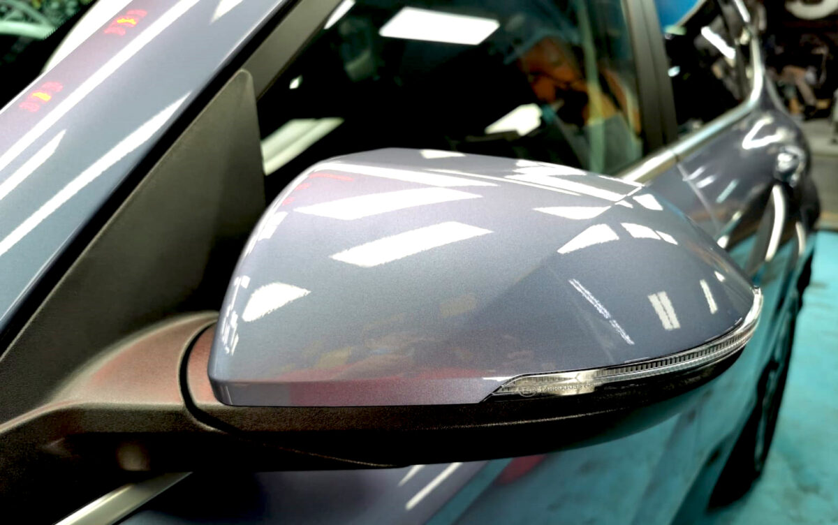 Side panel of the Hyundai SX2 Kona with the titanium finish locked in.