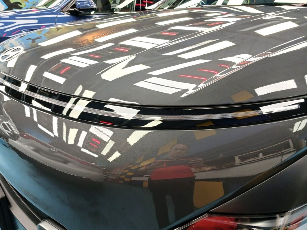 The SX2 Kona's coated paintwork showing clean reflections.