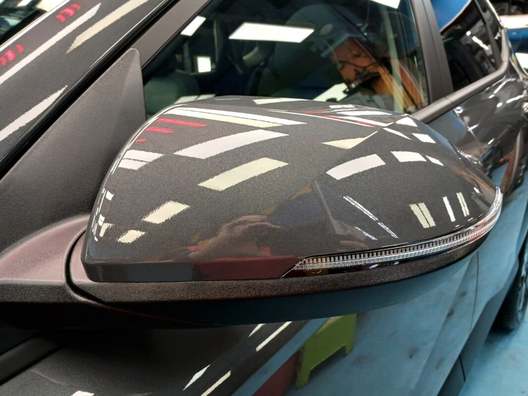 Side panel of the Hyundai SX2 Kona with the titanium finish locked in.