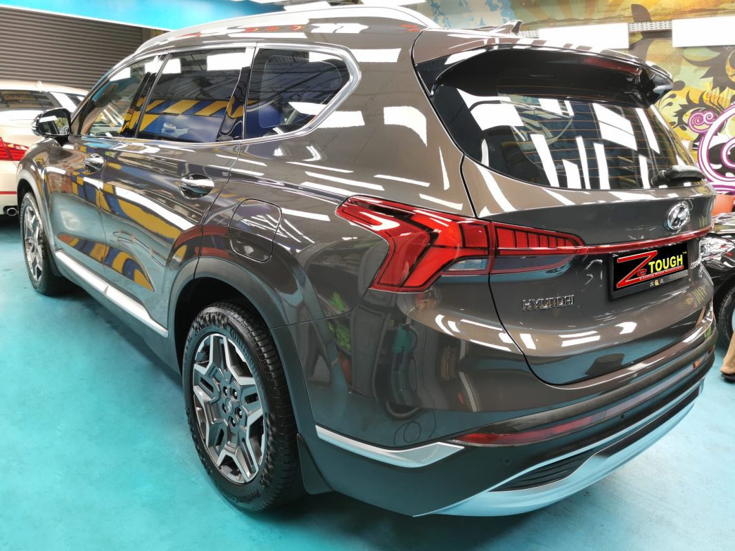 Rear quarter of the Hyundai TM Santa Fe, glossy and protected.