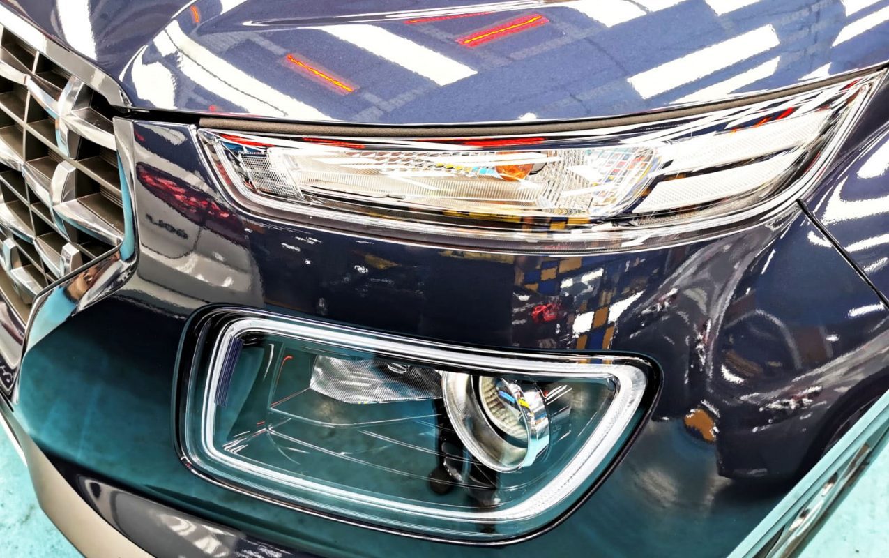 The Hyundai Venue parked in the workshop, freshly coated.
