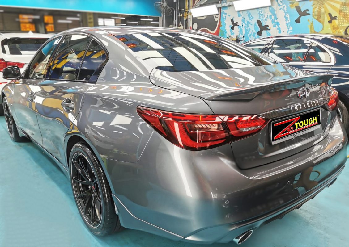Rear quarter of the Infiniti Q50, glossy and protected.