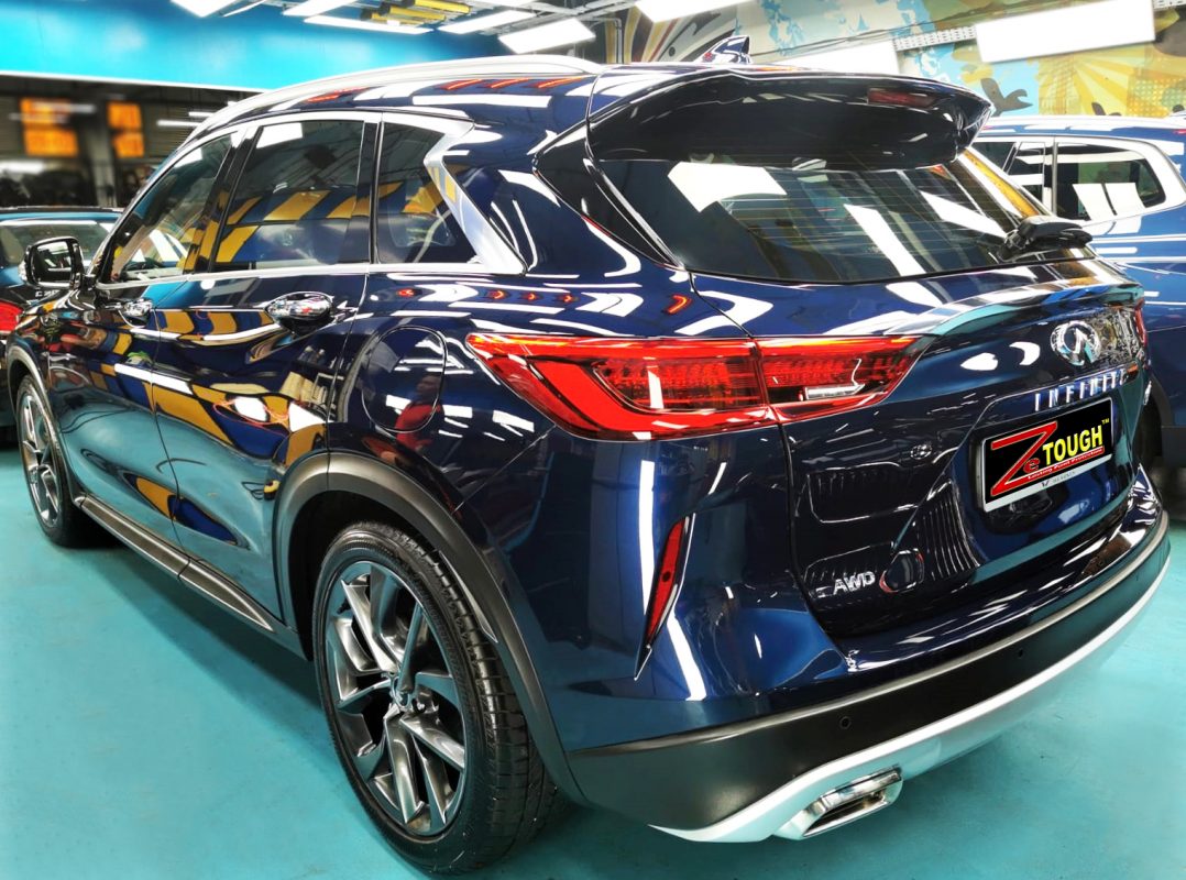 Rear quarter of the Infiniti QX50, glossy and protected.