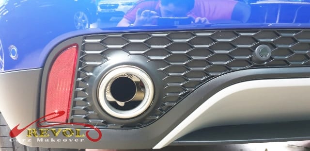 Rear quarter of the Jaguar E-Pace, glossy and protected.