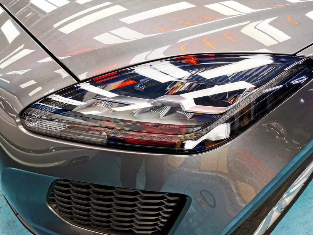 The E-Pace's coated paintwork showing clean reflections.