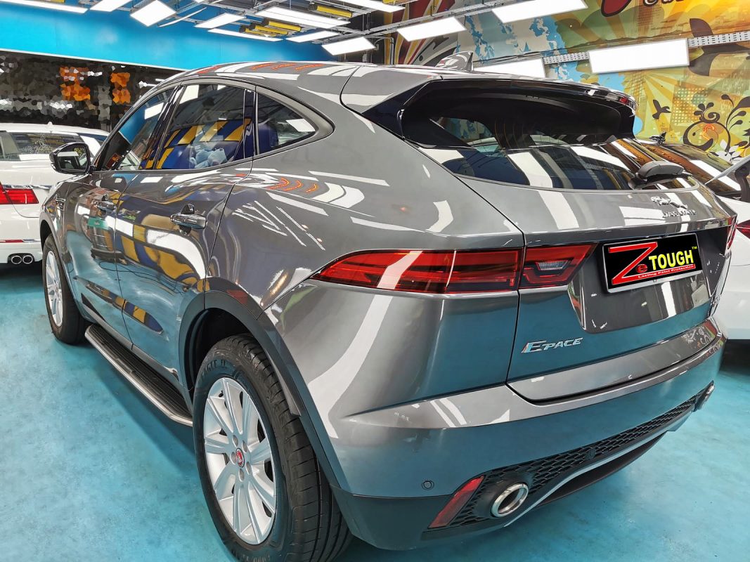 Rear quarter of the Jaguar E-Pace, glossy and protected.