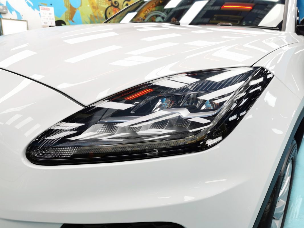 The E-Pace's coated paintwork showing clean reflections.