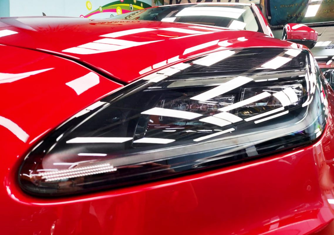The E-Pace's coated paintwork showing clean reflections.