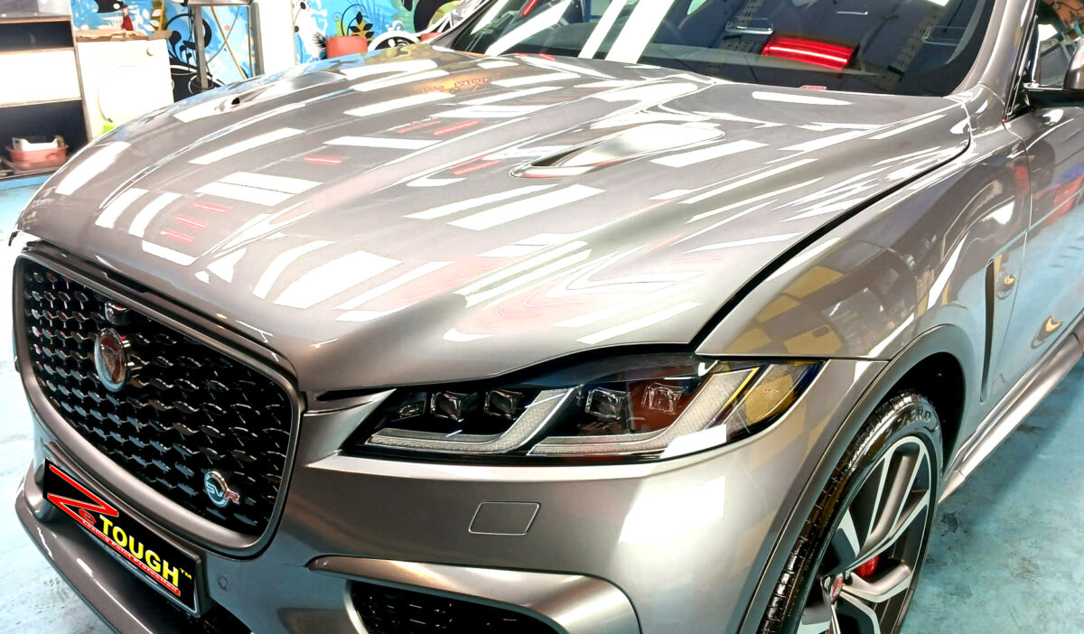 The Jaguar F-Pace from a side angle after the ceramic coating.