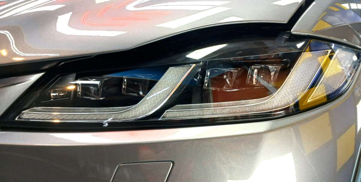 The F-Pace's coated paintwork showing clean reflections.