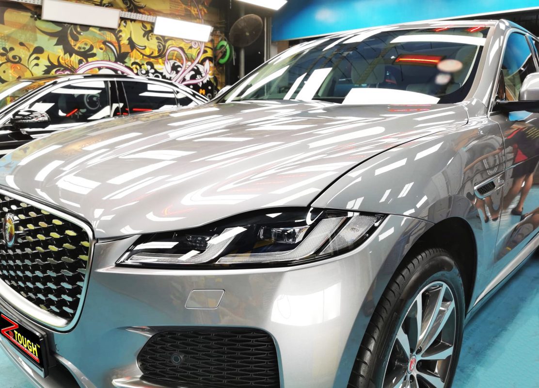The Jaguar F-Pace from a side angle after the ceramic coating.