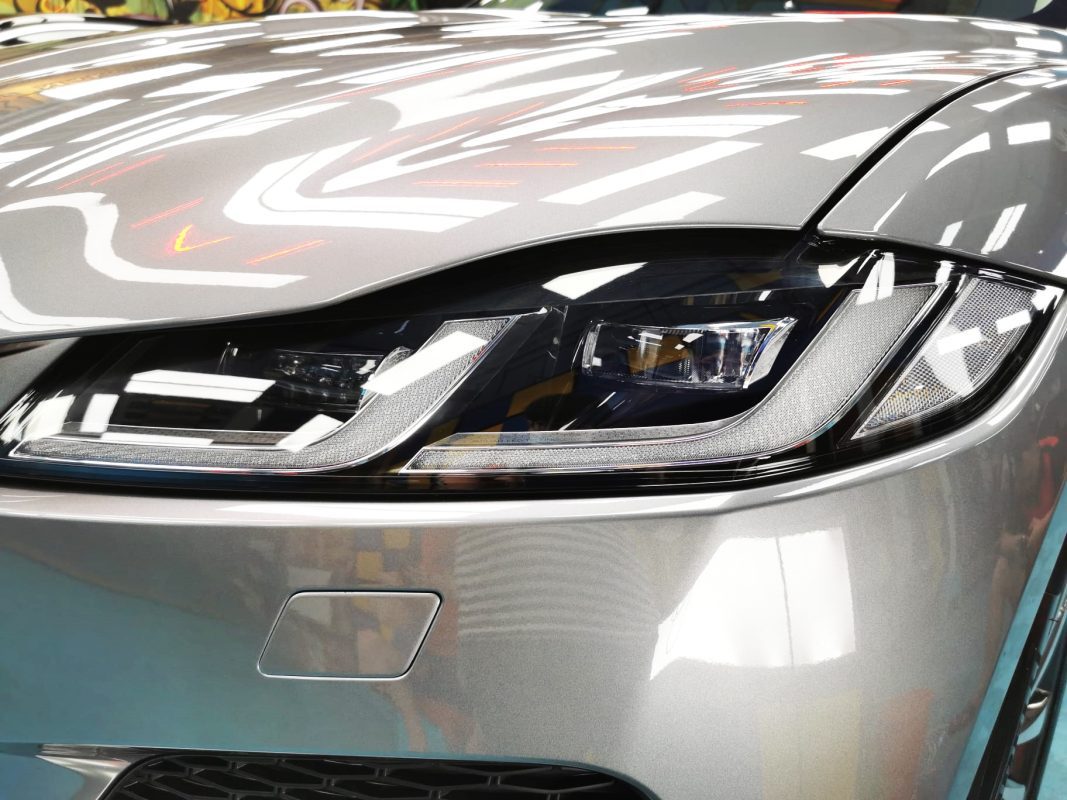 The F-Pace's coated paintwork showing clean reflections.