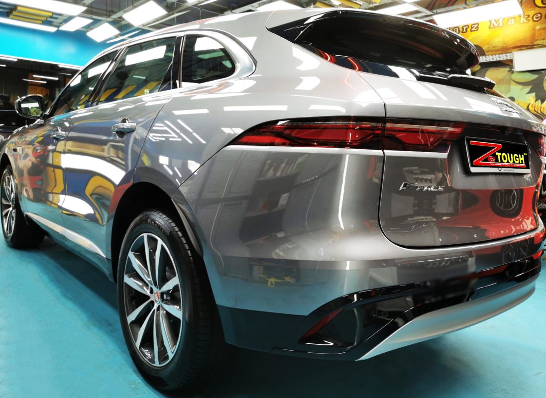 Rear quarter of the Jaguar F-Pace, glossy and protected.