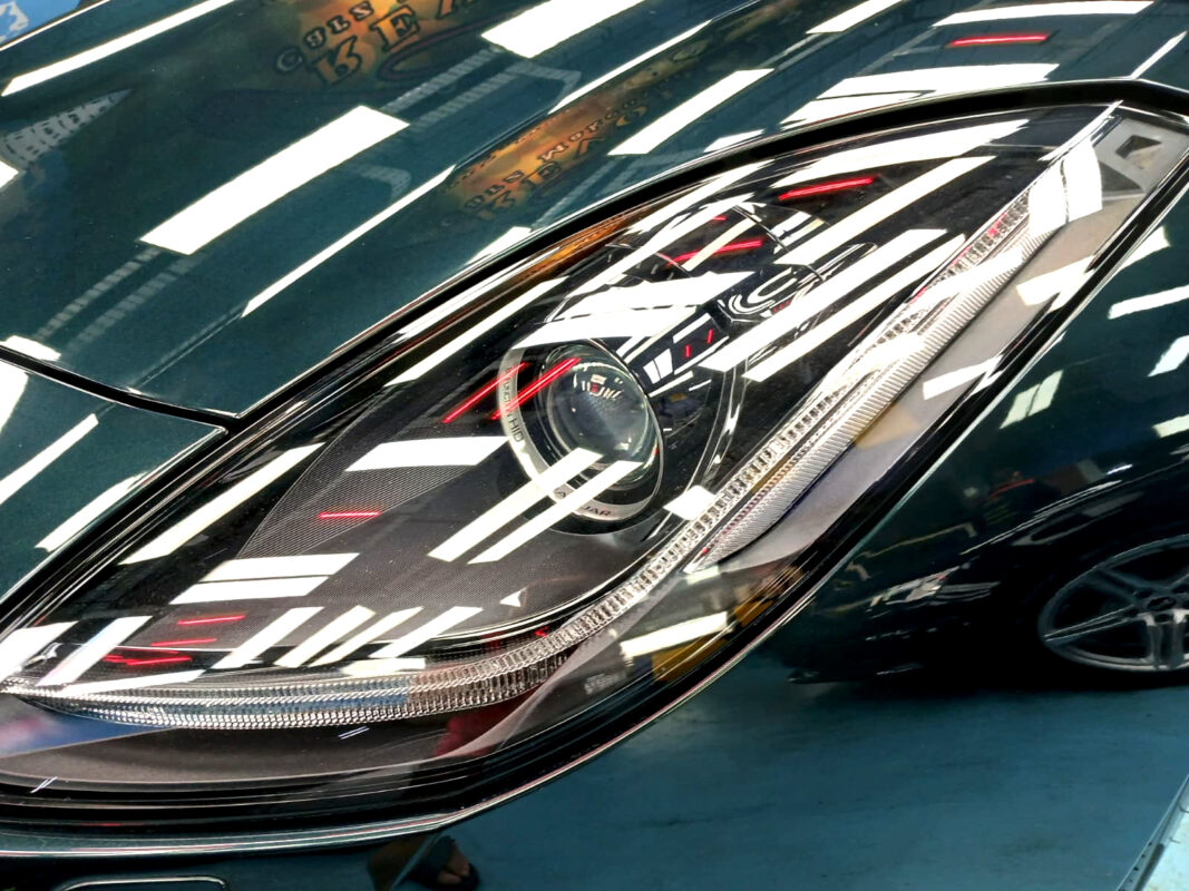 The F-Type's coated paintwork holding clean reflections.