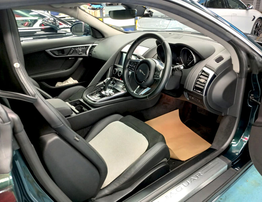 The Jaguar F-Type parked in the workshop, freshly coated.