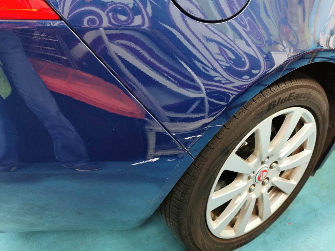 Chipped and scratched paintwork on the XE at intake.