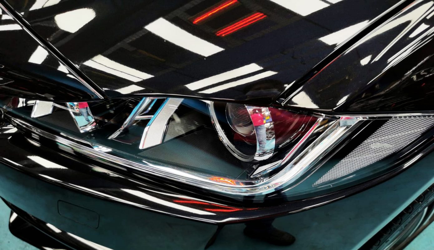 The XE's coated paintwork showing clean reflections.