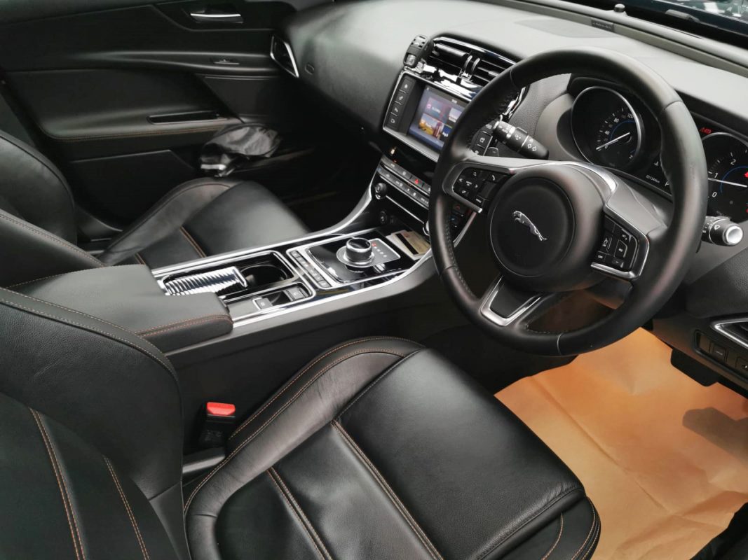 The Jaguar XE parked in the workshop, freshly coated.