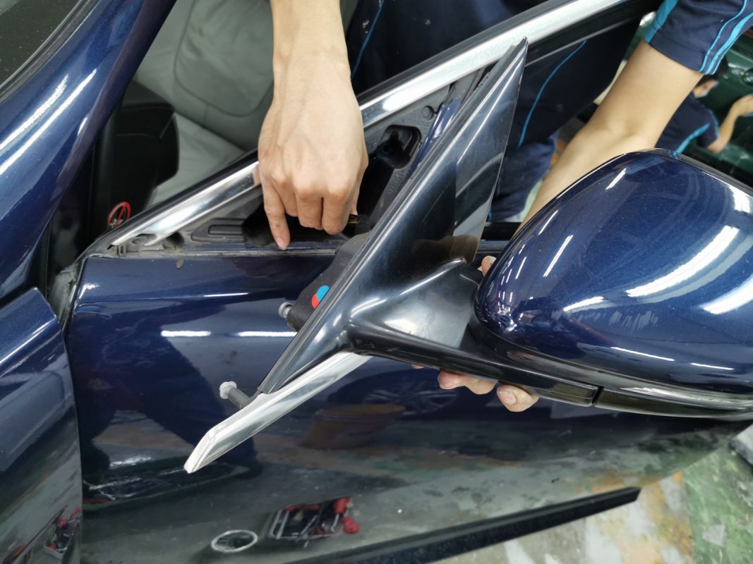 The XF with car parts removed in preparation for spraying.