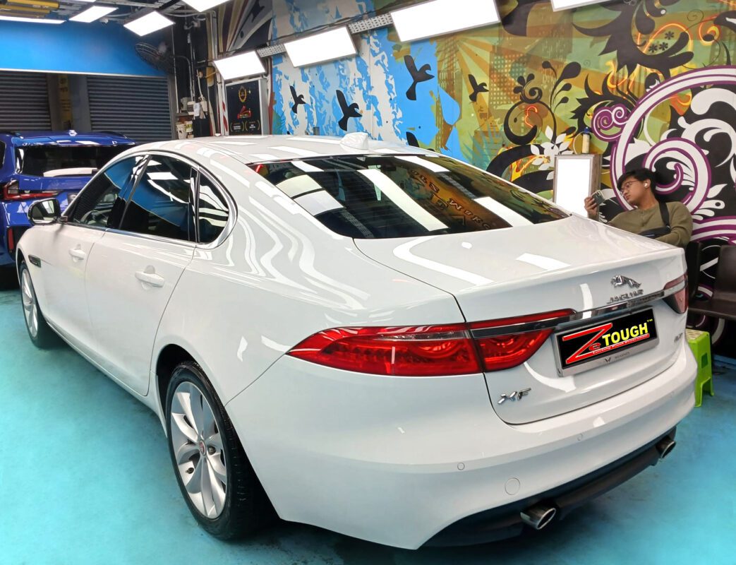 Front three-quarter view of the Jaguar XF after coating.