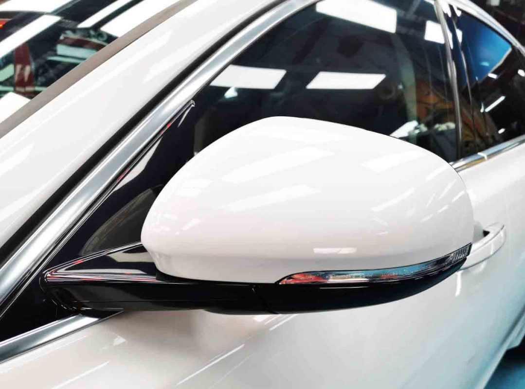 Front three-quarter view of the Jaguar XF after coating.