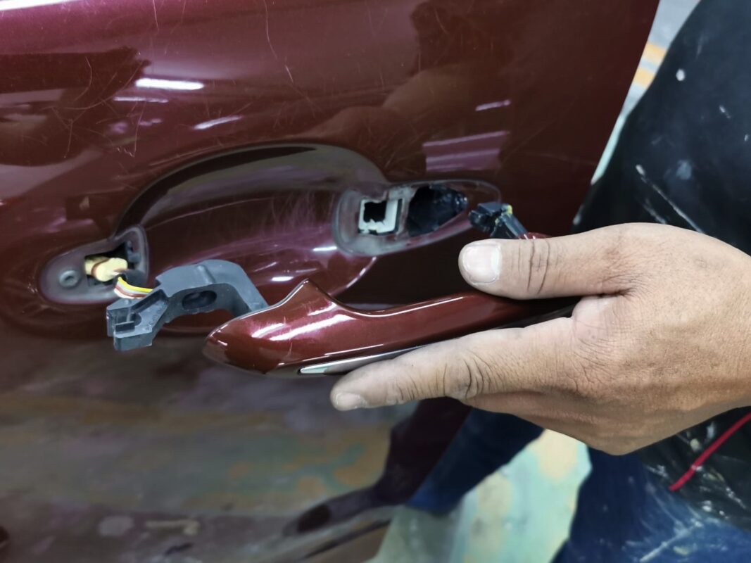 A door handle taken off the Jaguar XJ during strip-down.