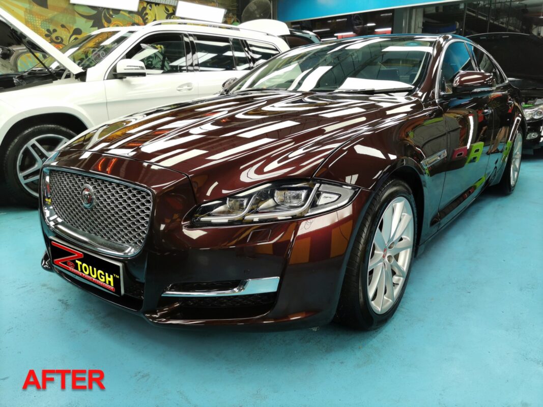 After: the same front end, resprayed and finished to a deep gloss.