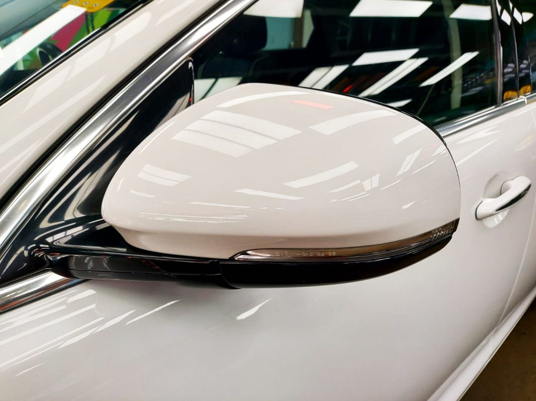 Front three-quarter view of the Jaguar XJ after coating.