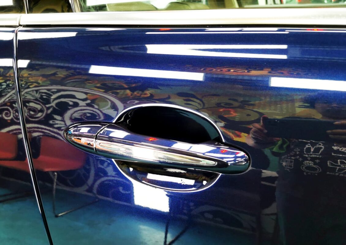 Side panel of the Jaguar XJ with the titanium finish locked in.