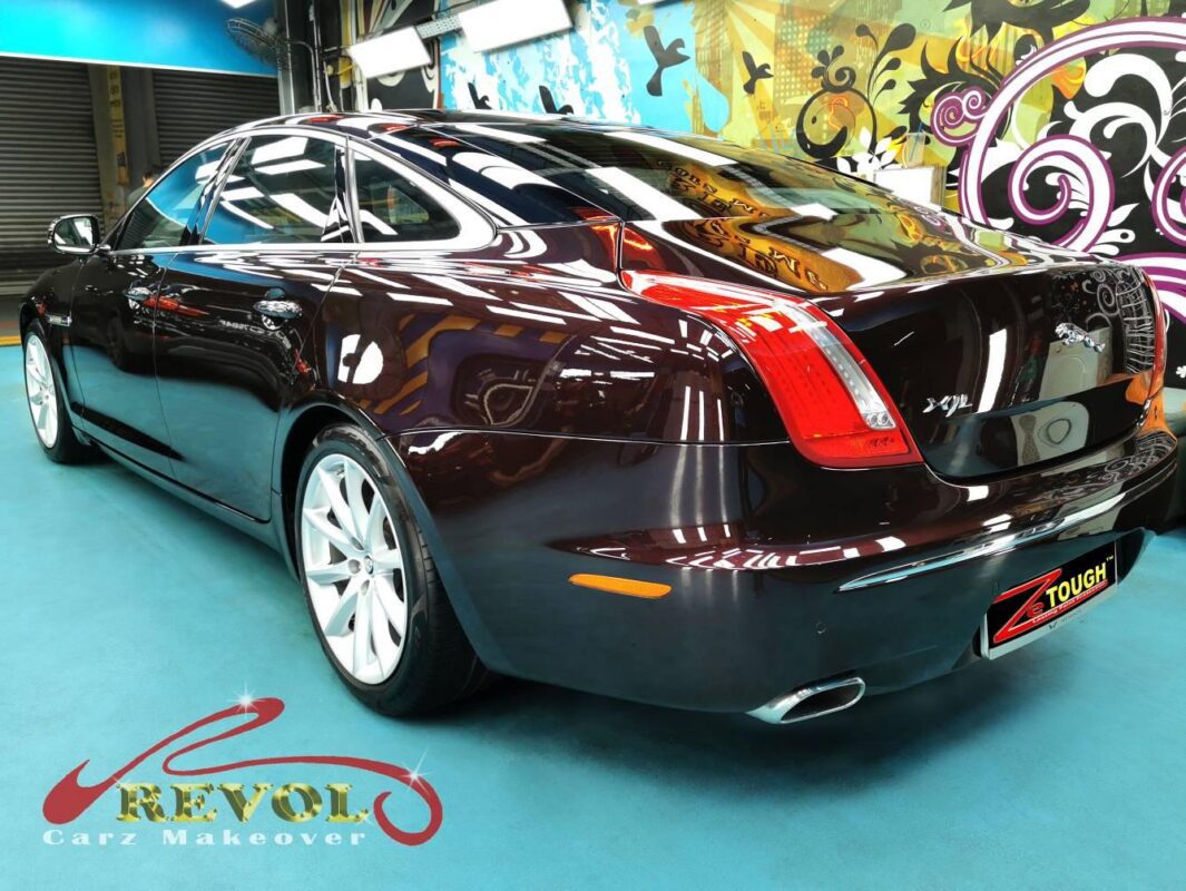 Rear quarter of the Jaguar XJL, glossy and protected.