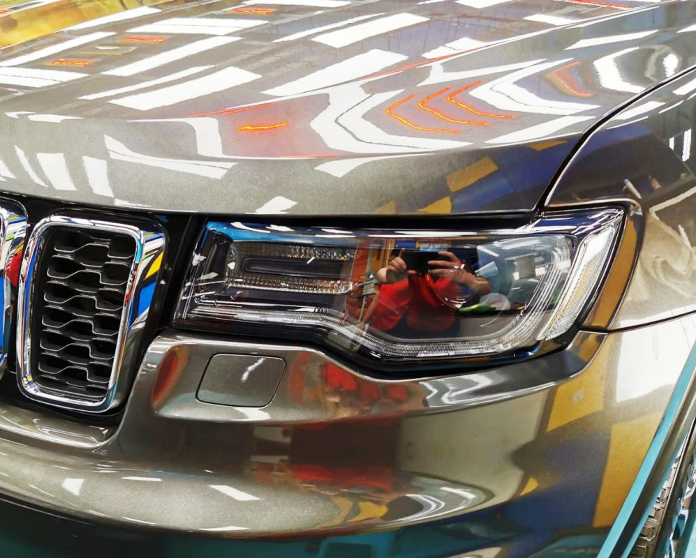 The Grande Cherokee's coated paintwork showing clean reflections.