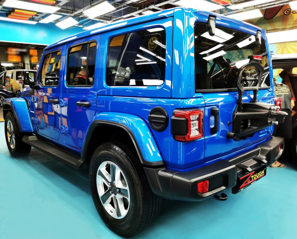 Close detail of the coated bodywork on the Jeep Wrangler.