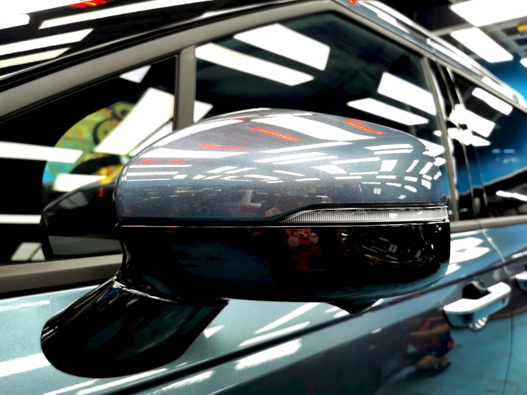 Side panel of the Kia Carnival with the titanium finish locked in.