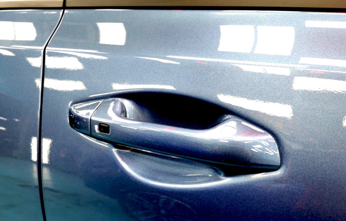 Front three-quarter view of the Kia Cerato after coating.