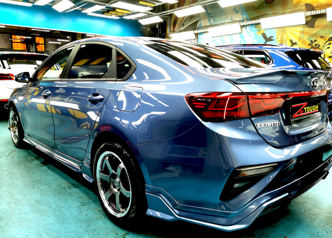 Rear quarter of the Kia Cerato, glossy and protected.