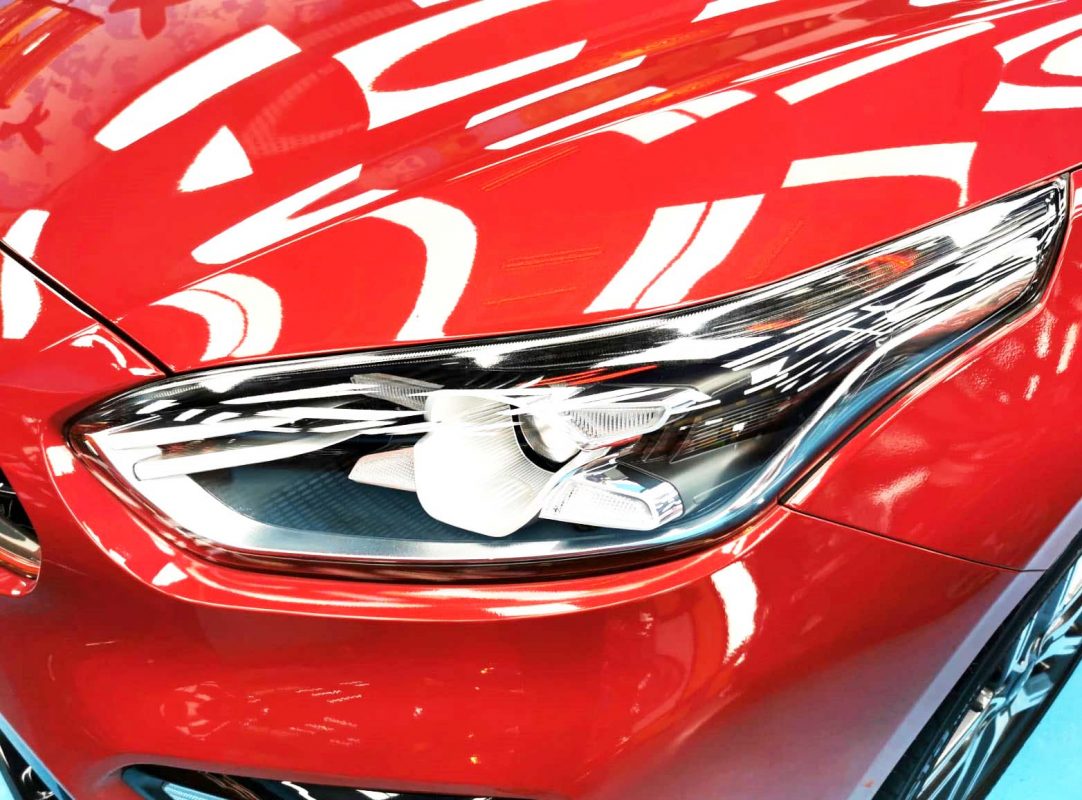 The Cerato's coated paintwork showing clean reflections.