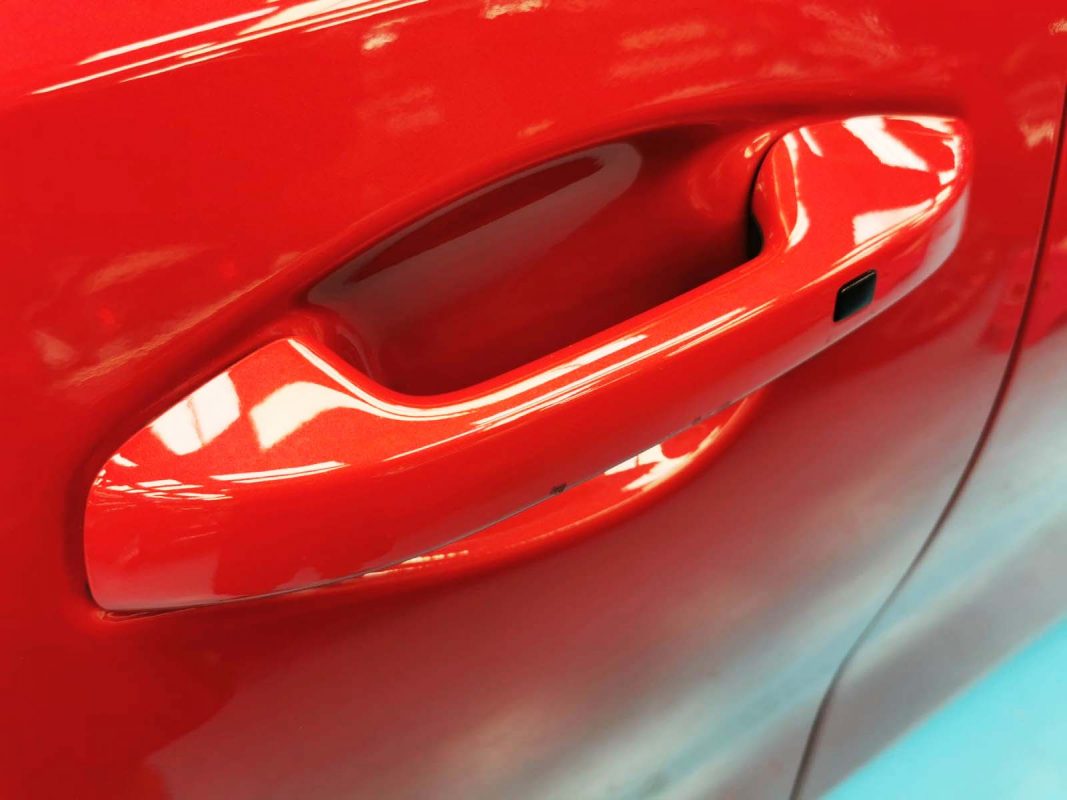 Rear quarter of the Kia Cerato, glossy and protected.