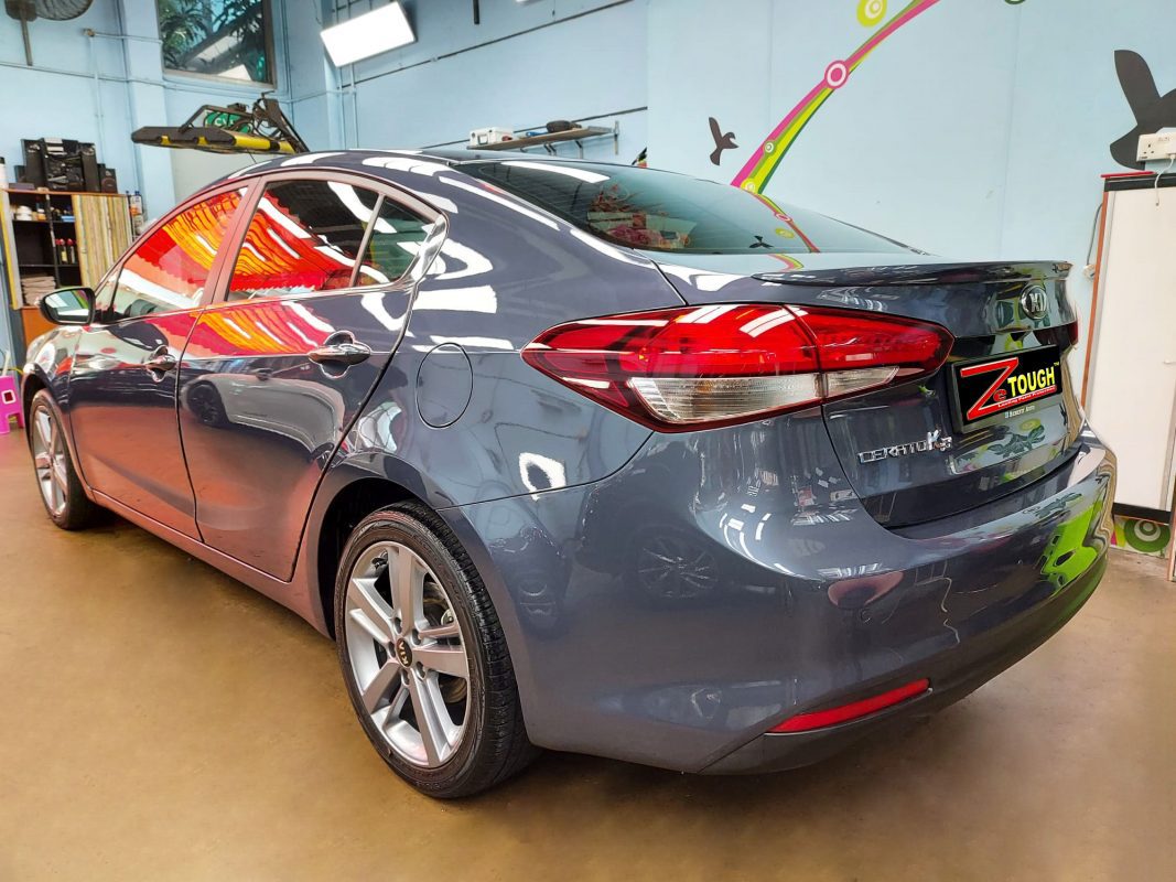 Close detail of the coated paintwork on the Kia Forte K3.