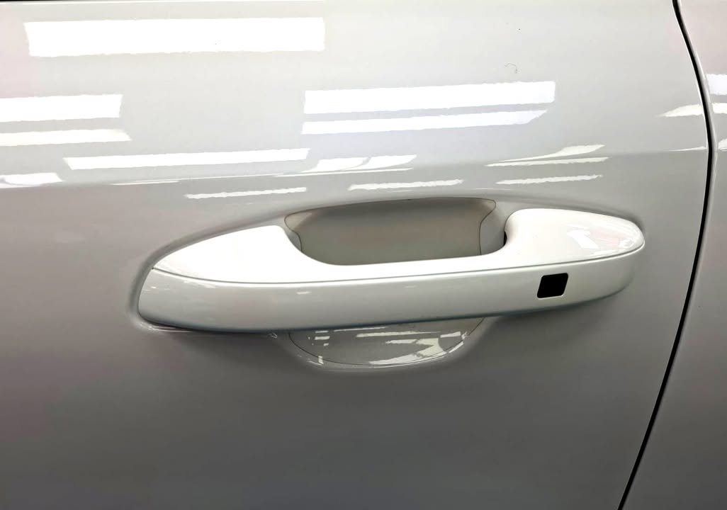 White door panel and handle.