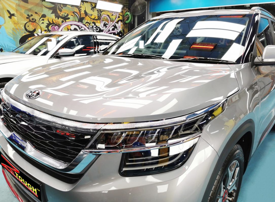 Side angle of the Kia Seltos after the titanium coating.