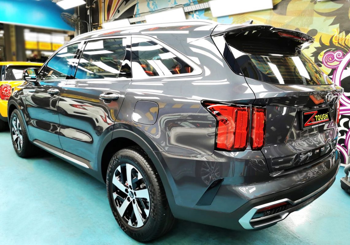 Rear quarter of the Kia Sorento, glossy and protected.