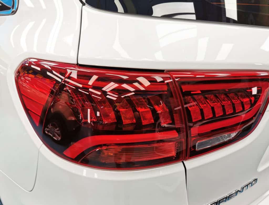 Rear quarter of the Kia Sorento, glossy and protected.