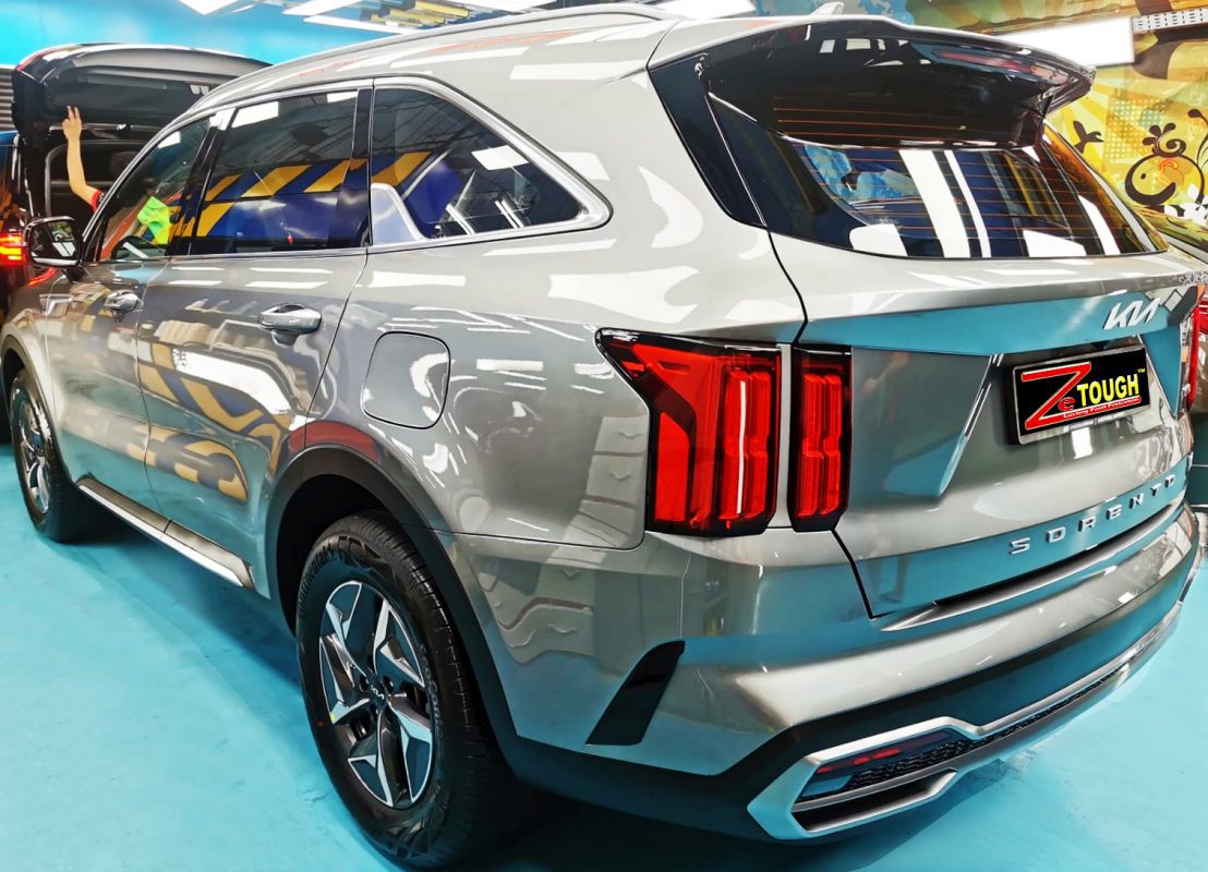 Rear quarter of the Sorento, glossy and protected.