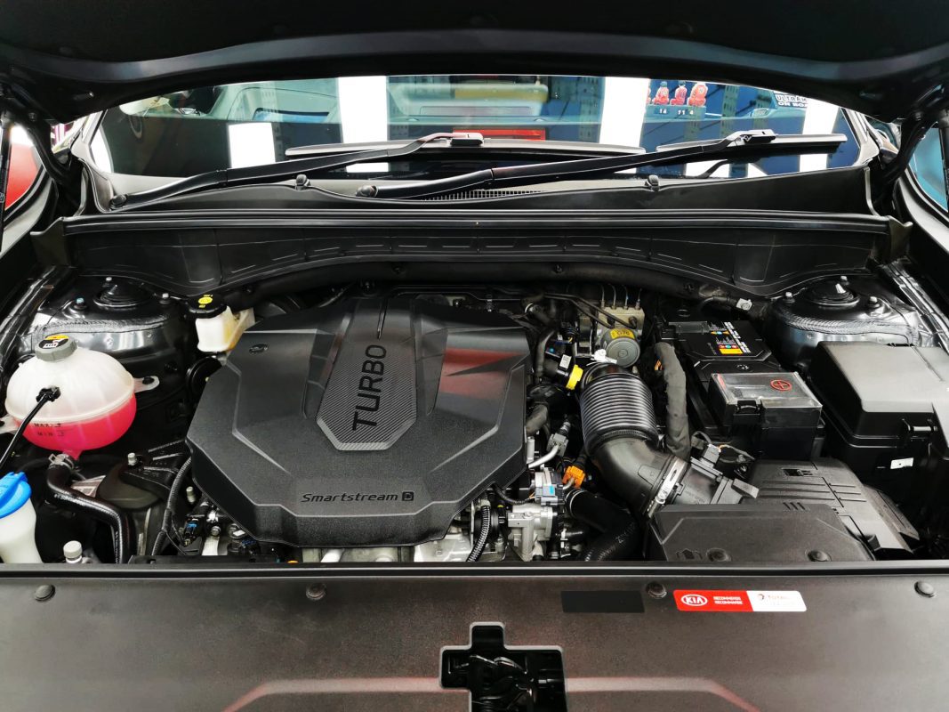 Front three-quarter view of the Sorento, freshly coated.