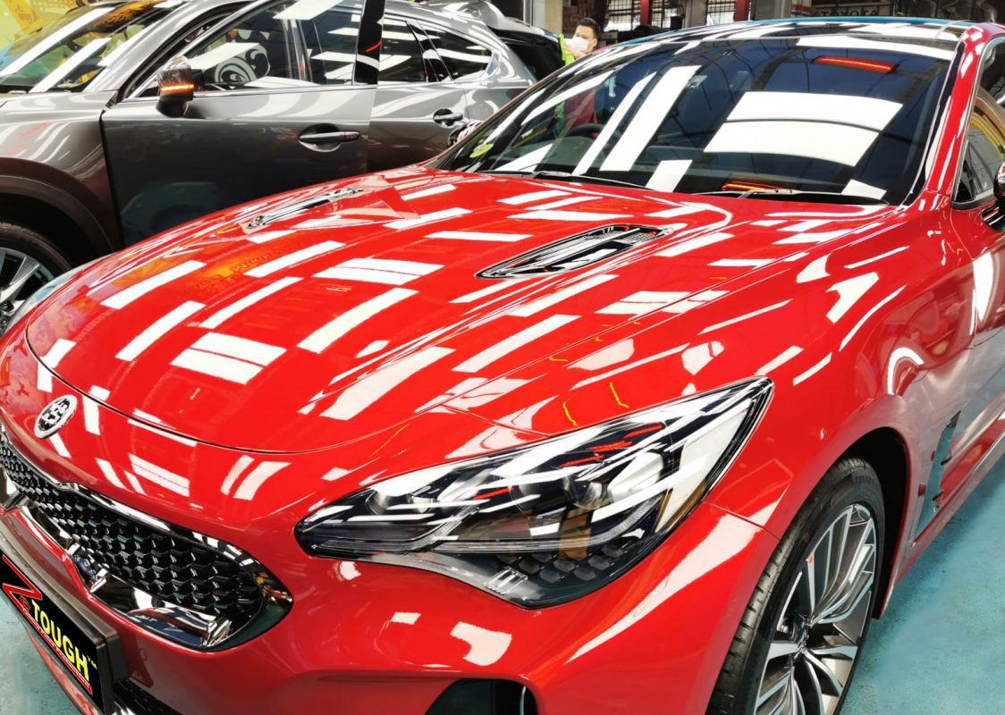 The Kia Stinger from a side angle after the ceramic coating.